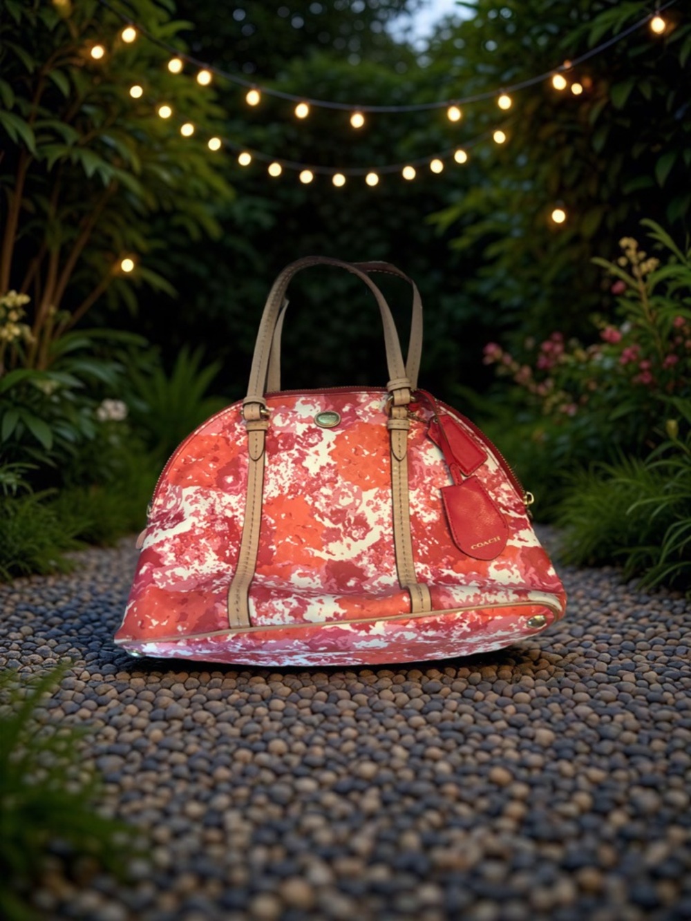 Coach Peyton Floral Cora Domed Satchel in the floral print with leather trim.